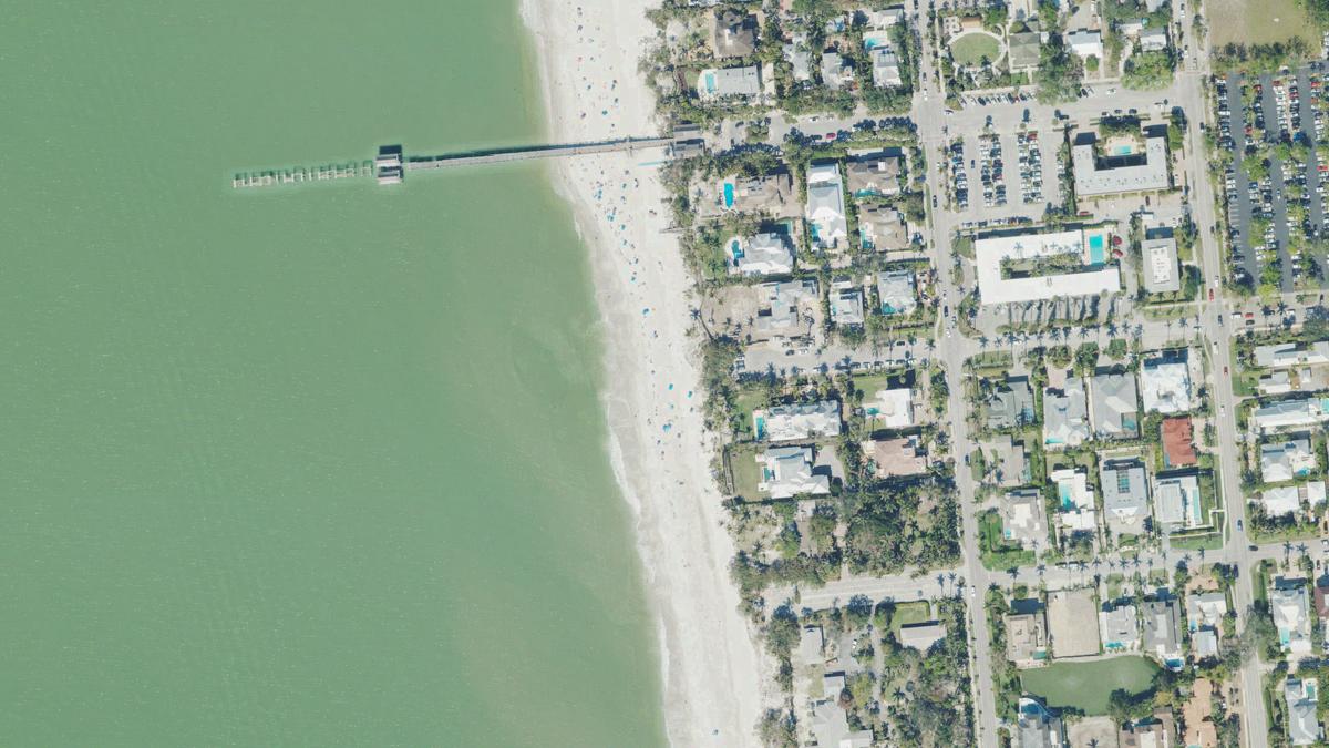 Aerial view of 13th Avenue South Beach in Naples, Florida, shoreline and surroundings, USDA NAIP imagery from May 2023