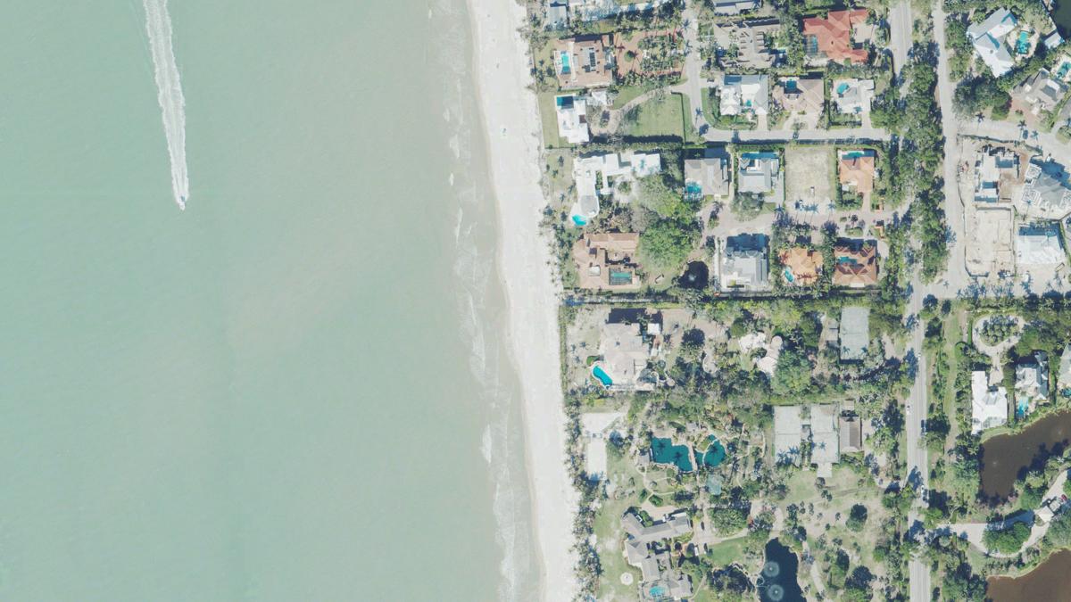 Aerial view of 21st Avenue South Beach in Naples, Florida, shoreline and surroundings, USDA NAIP imagery from May 2023