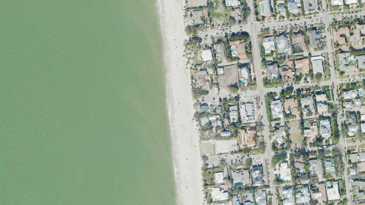 Aerial view of 6th Avenue South Beach in Naples, Florida, shoreline and surroundings, USDA NAIP imagery from May 2023