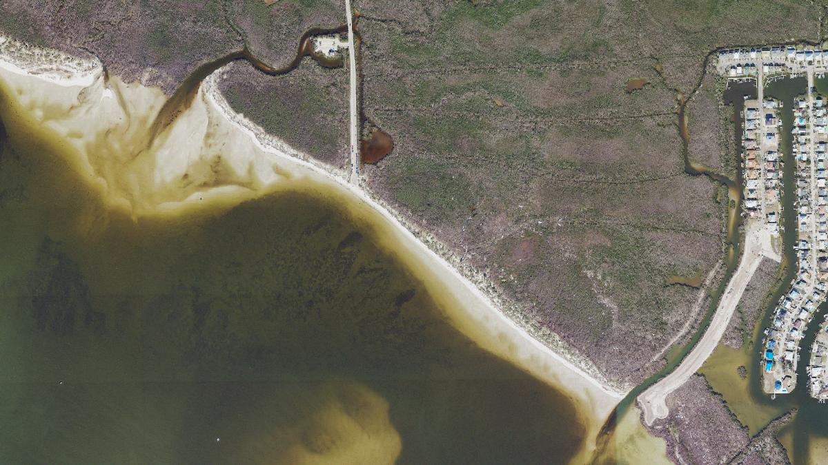 Aerial view of Bunche Beach in Fort Myers Beach, Florida, shoreline and surroundings, USDA NAIP imagery from May 2023