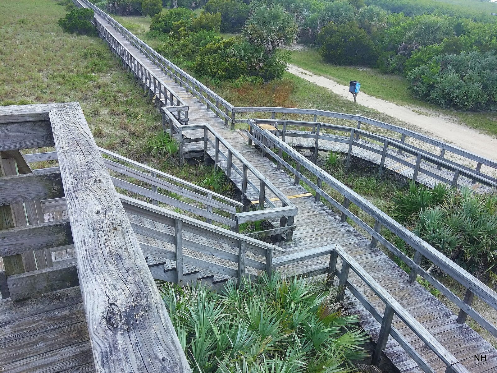 Inlet Shore Beach Area: wooden boardwalk and stairs through coastal vegetation and marshland