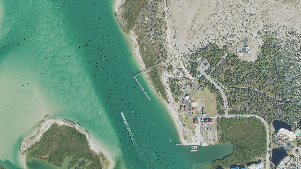Aerial view of Inlet Shore Beach Area in New Smyrna Beach, Florida, shoreline and surroundings, USDA NAIP imagery from May 2023
