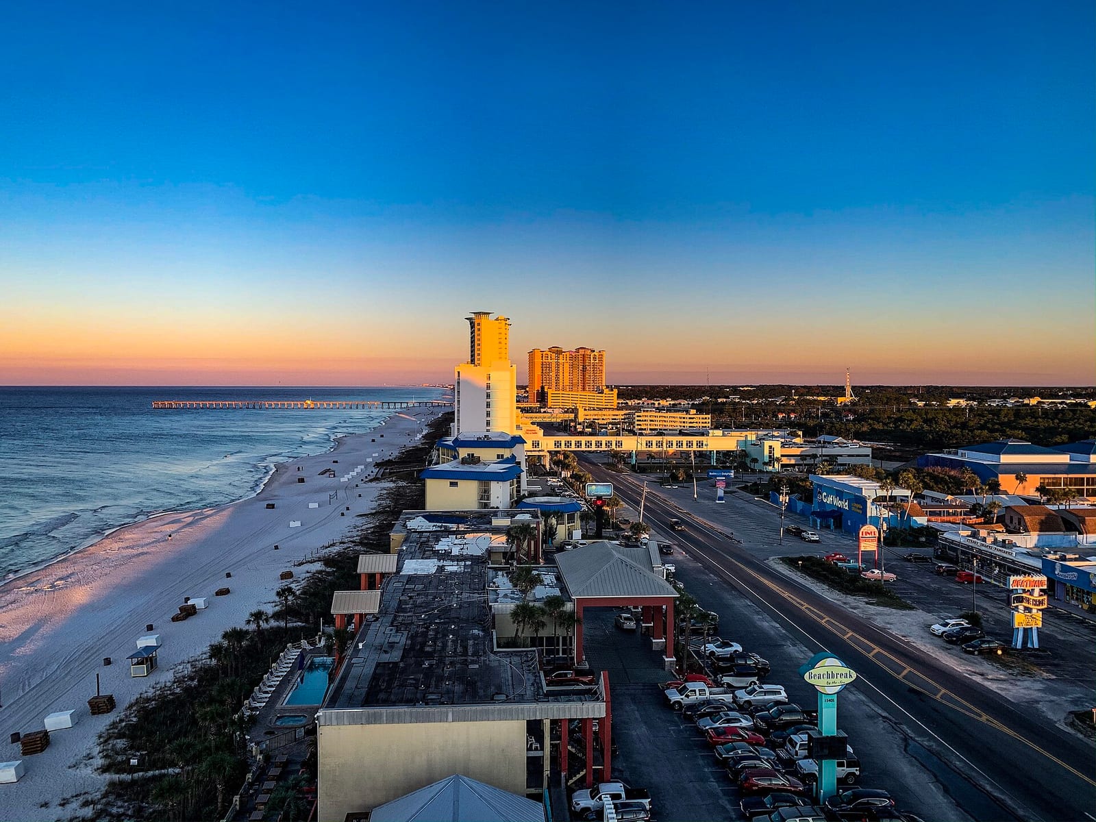 Panama City Beaches: cruise ship docked at Panama City Beach at sunset with boardwalk