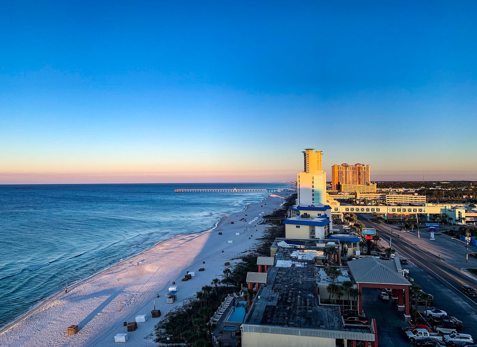 Panama City Beaches: cruise ship docked at Panama City Beach at sunset with high-rise hotels