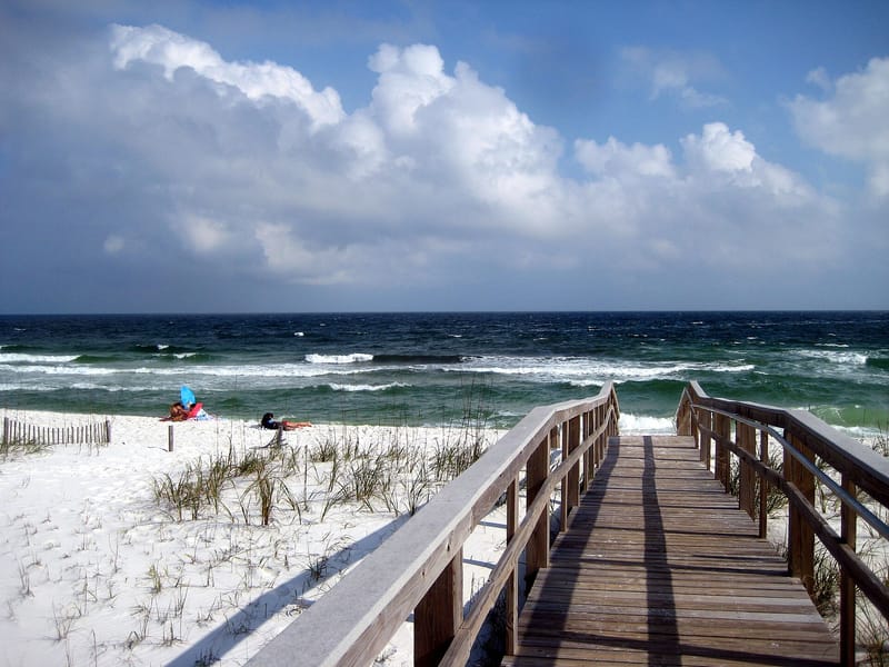 Park East On-Leash Dog Beach: wooden boardwalk over dunes leading to beach and ocean waves