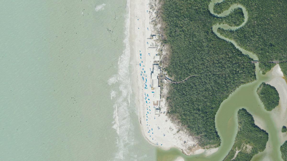 Aerial view of Pelican Bay Commons Beach in Naples, Florida, shoreline and surroundings, USDA NAIP imagery from May 2023