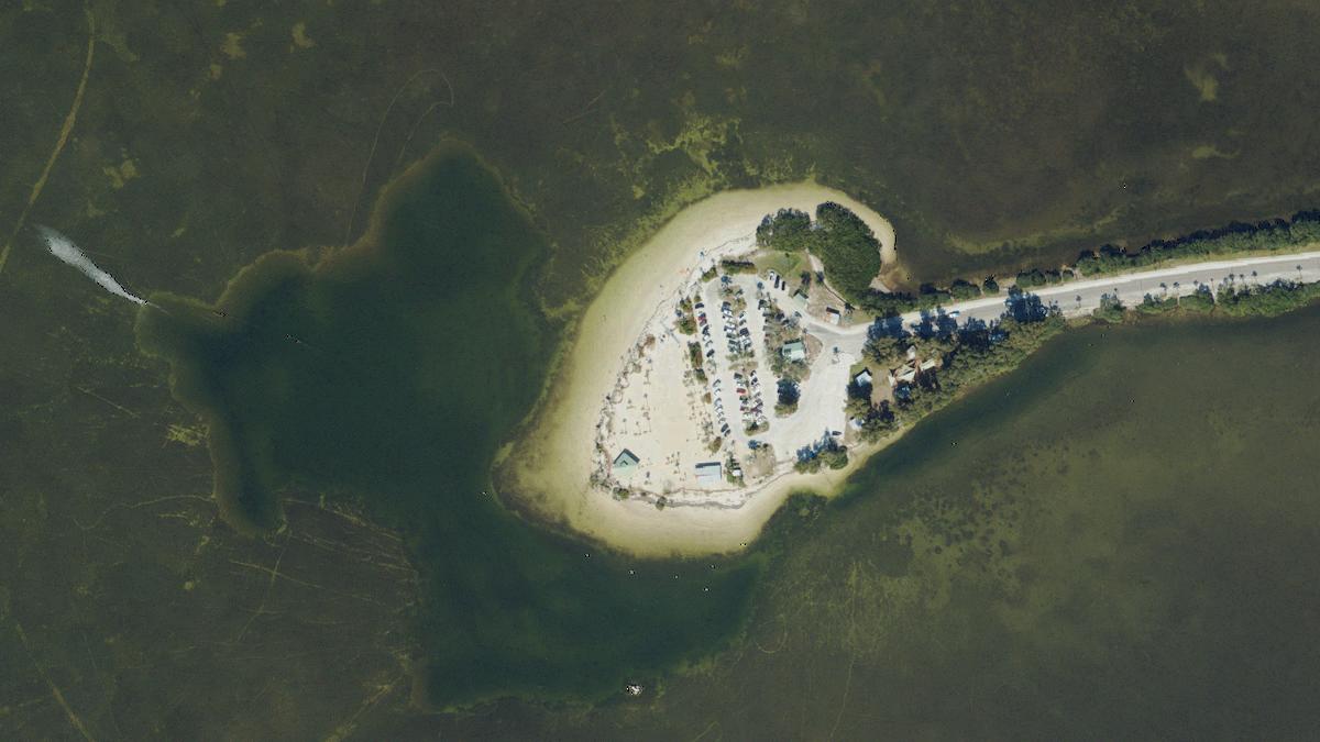 Aerial view of Sunset Beach in Tarpon Springs, Florida, shoreline and surroundings, USDA NAIP imagery from May 2023