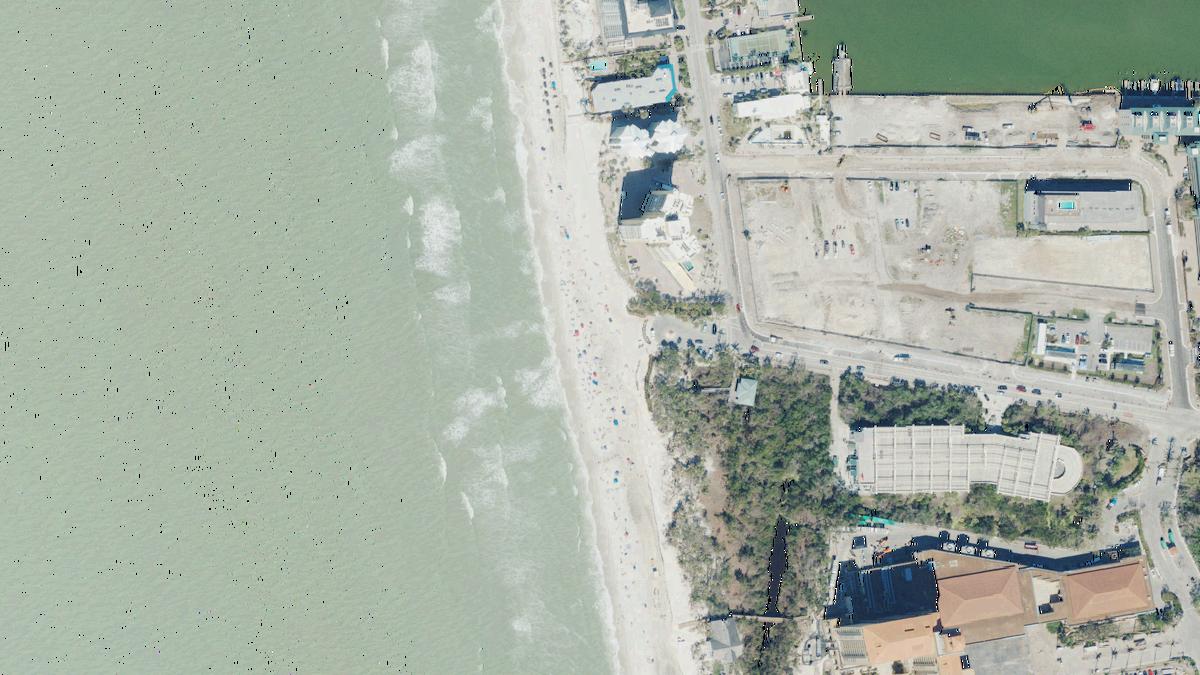 Aerial view of Vanderbilt Beach in Naples, Florida, shoreline and surroundings, USDA NAIP imagery from May 2023